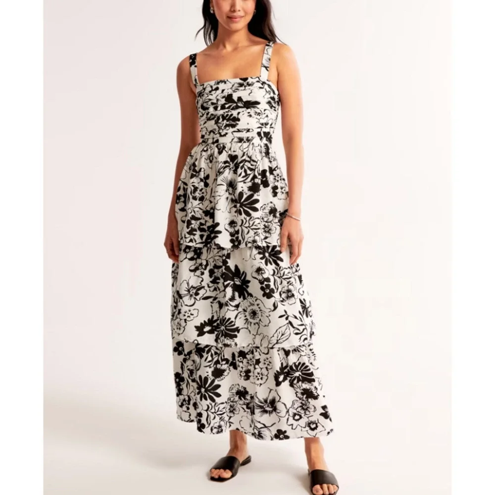 emerson tiered maxi dress Like a cascading waterfall, let this maxi dress be your partner in weaving the narrative of beauty and grace. Products Featured: Emerson Tiered Puff Sleeve Maxi Dress Explore more at LOVEANDBRAVERY.COM